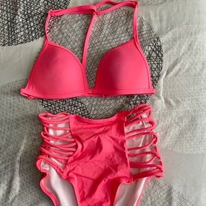 Neon orange high waisted bottoms, push up top